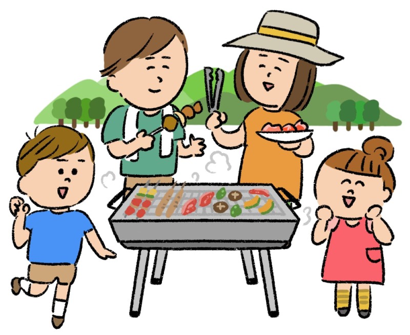 バーベキューをする家族