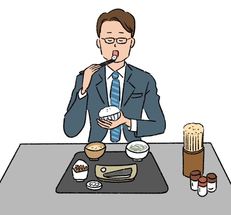 ランチを食べるサラリーマン