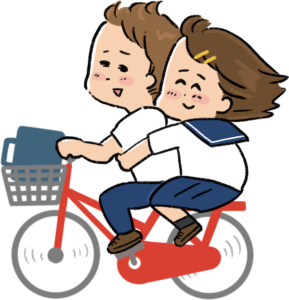 二人乗りする学生カップル