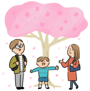 お花見をする男の子がいる3人家族