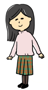 ピンクのセーター着ている女性